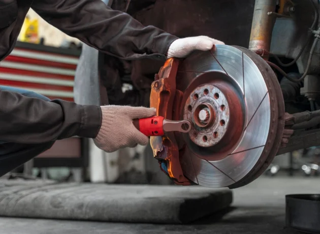 worker-repairing-car-side-view_23-2150171257